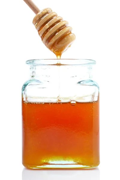Honig gießen — Stockfoto