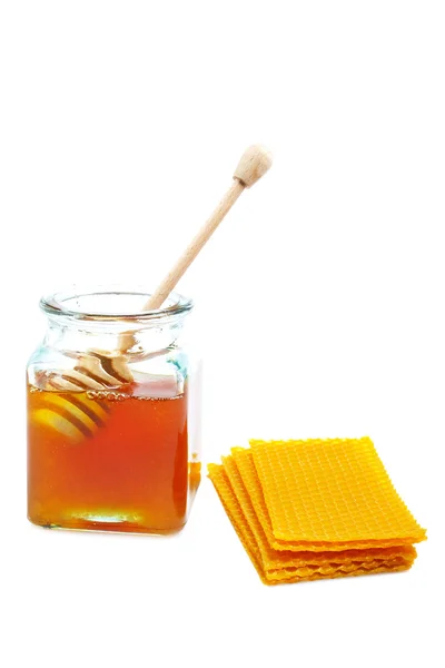 Honigglas und Wabe — Stockfoto