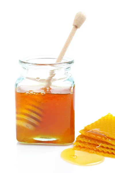 Jarra de miel y peine de miel — Foto de Stock