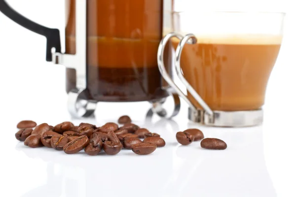 Cup and coffee pot and beans — Stock Photo, Image