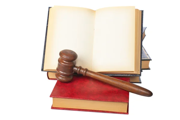 Wooden gavel and old opened law book — Stock Photo, Image