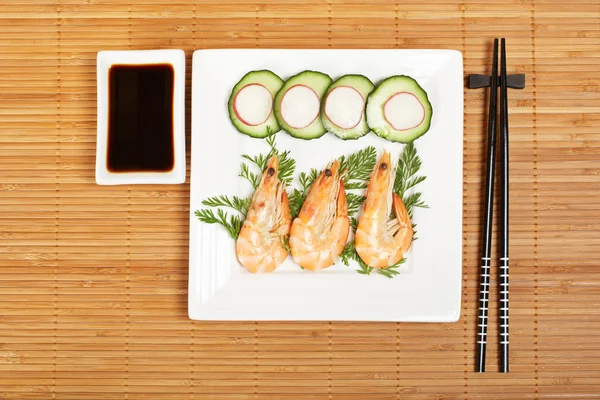 Plate of prawns with soy sauce — Stock Photo, Image