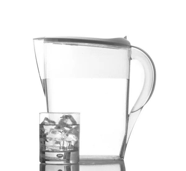 Pitcher and glass with droplets — Stock Photo, Image