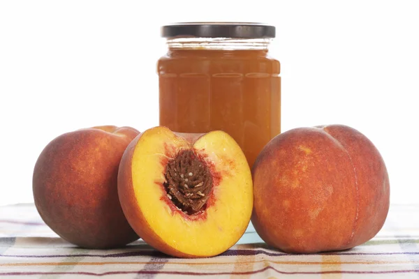 Peach jam and some fresh fruits — Stock Photo, Image