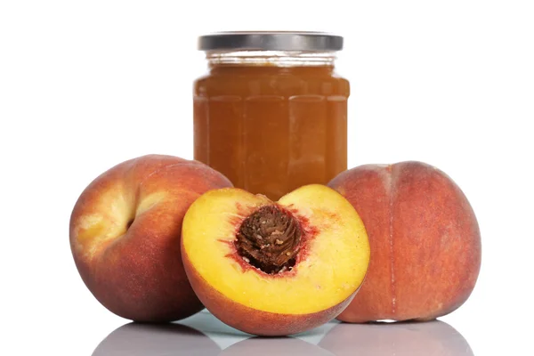 Pfirsichmarmelade und einige frische Früchte — Stockfoto