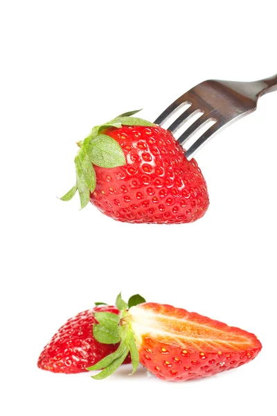 El tenedor pinchando la fresa —  Fotos de Stock