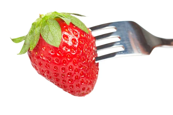 El tenedor pinchando la fresa —  Fotos de Stock