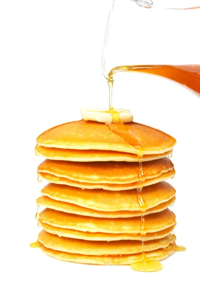 Pouring syrup on the pancakes — Stock Photo, Image