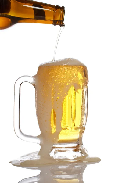 Pouring beer into mug — Stock Photo, Image