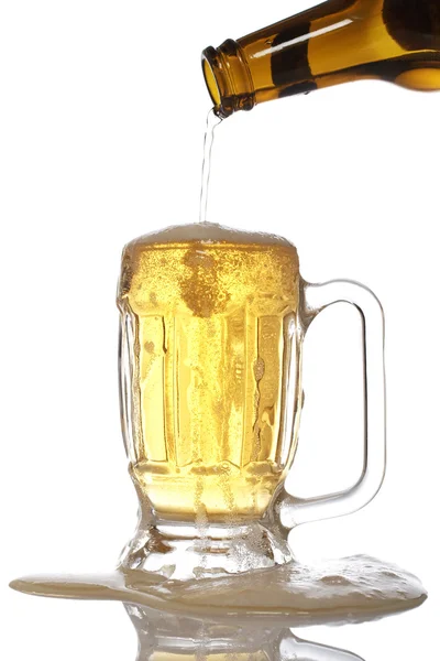 Pouring beer into mug — Stock Photo, Image
