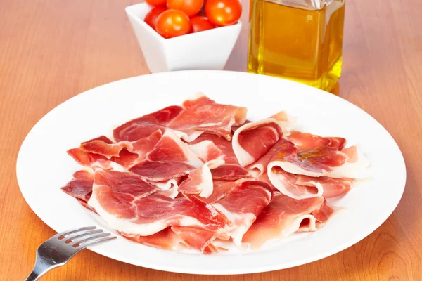 Slices of spanish ham — Stock Photo, Image