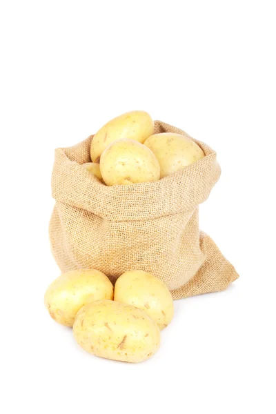 ジャガイモと黄麻布の袋 — ストック写真