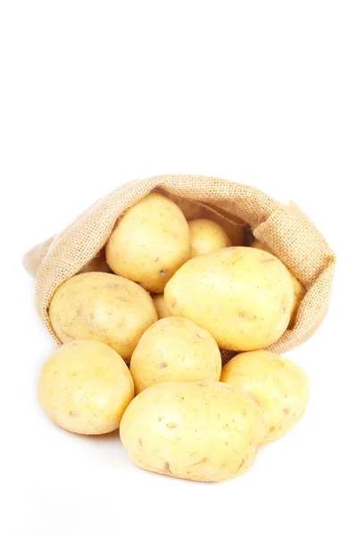ジャガイモと黄麻布の袋 — ストック写真