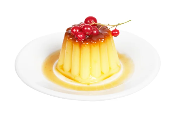 Cream caramel dessert with red currants — Stock Photo, Image