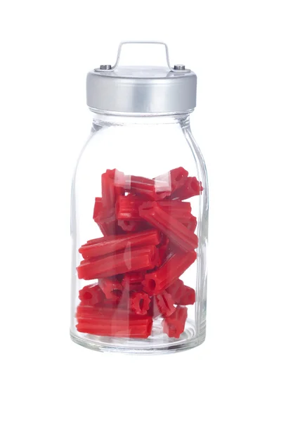 ガラスの瓶に赤い licorice — ストック写真