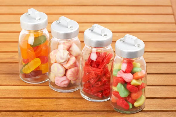 Glass jars of candies — Stock Photo, Image
