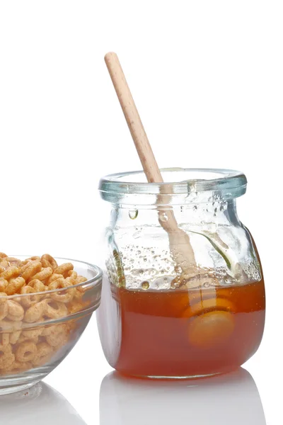 Honey and cereals — Stock Photo, Image