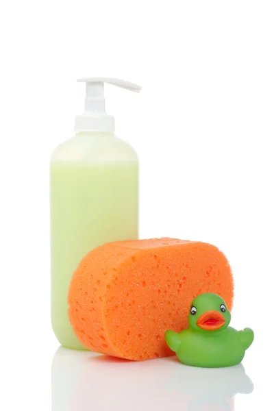 Rubber duck, soap and sponge — Stock Photo, Image