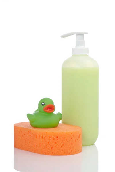 Rubber duck, soap and sponge — Stock Photo, Image