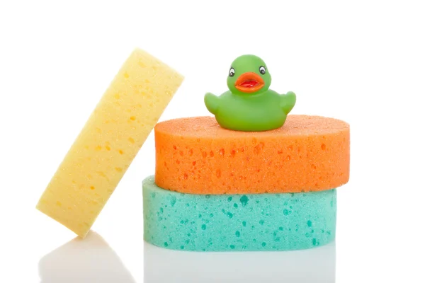 Drie sponzen en rubber duck — Stockfoto