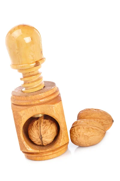 Vlašské ořechy a dřevěný Louskáček — Stock fotografie