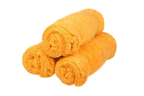 Τρεις κυλίνδρους πορτοκαλί πετσέτες — Φωτογραφία Αρχείου