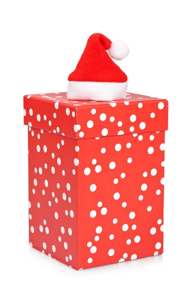 Gift box with christmas hat — Stock Photo, Image