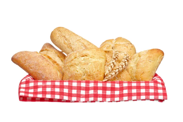 Crusty bread buns into the basket — Stock Photo, Image