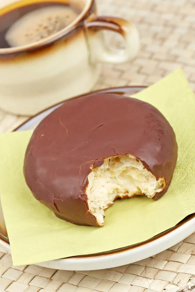 Delicious chocolate donut with coffee — Stock Photo, Image