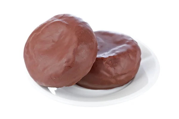 Due deliziose ciambelle al cioccolato su un piatto — Foto Stock