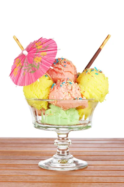 Multi flavor ice cream glass with umbrella — Stock Photo, Image