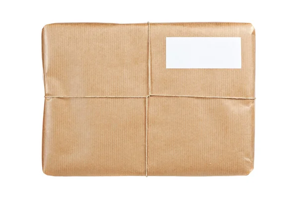 Boş etiket ile kahverengi paket — Stok fotoğraf