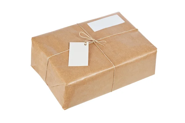Paquete marrón con etiquetas en blanco — Foto de Stock