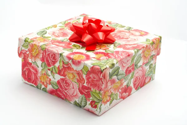 Gift box with red ribbon, on white background — Stock Photo, Image