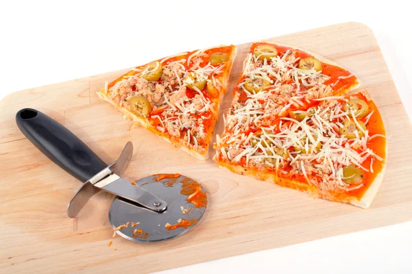 Slices of Italian pizza and cutter — Stock Photo, Image