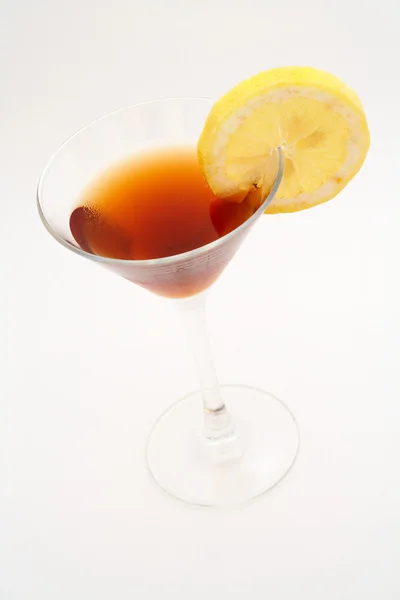 Red cocktail with lemon — Stock Photo, Image