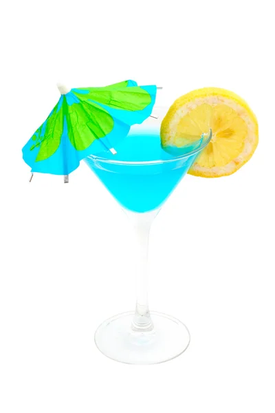 Blue cocktail with lemon and umbrella — Stock Photo, Image