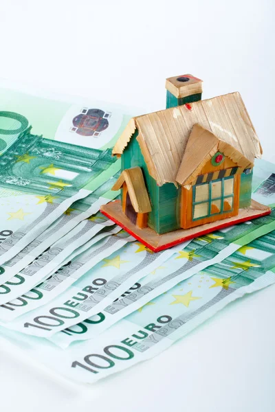 Billetes de casa y euro — Foto de Stock