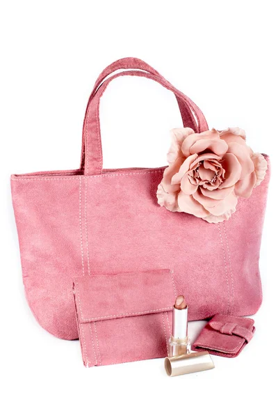 Surtido de bolsos rosas y lápiz labial — Foto de Stock