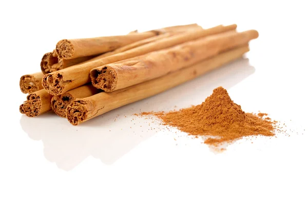 Sticks and powder of cinnamon — Stock Photo, Image
