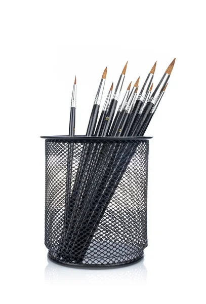 Paintbrushes in the basket — Stock Photo, Image