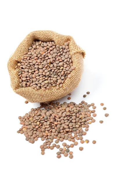 Sacola de serapilheira com lentilhas — Fotografia de Stock
