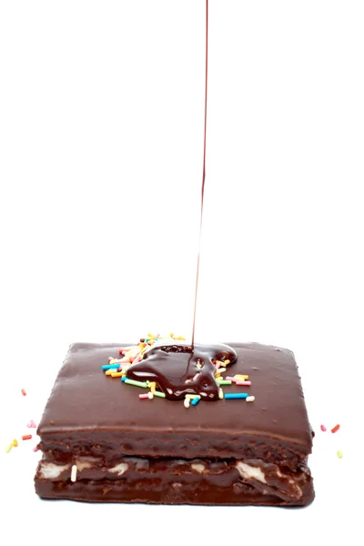 Çikolata şurubu dökülür — Stok fotoğraf