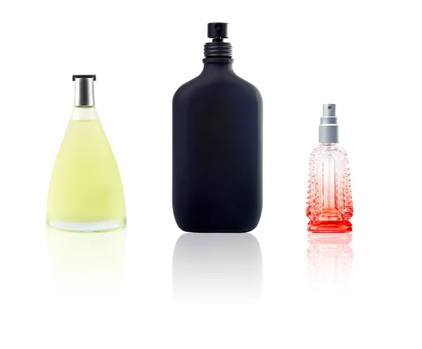 Três garrafas de perfum com reflexão — Fotografia de Stock