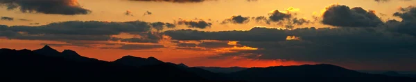 Sunset panoramic of spring season — Stock Photo, Image