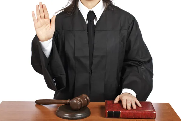 Female judge taking oath Stock Photo