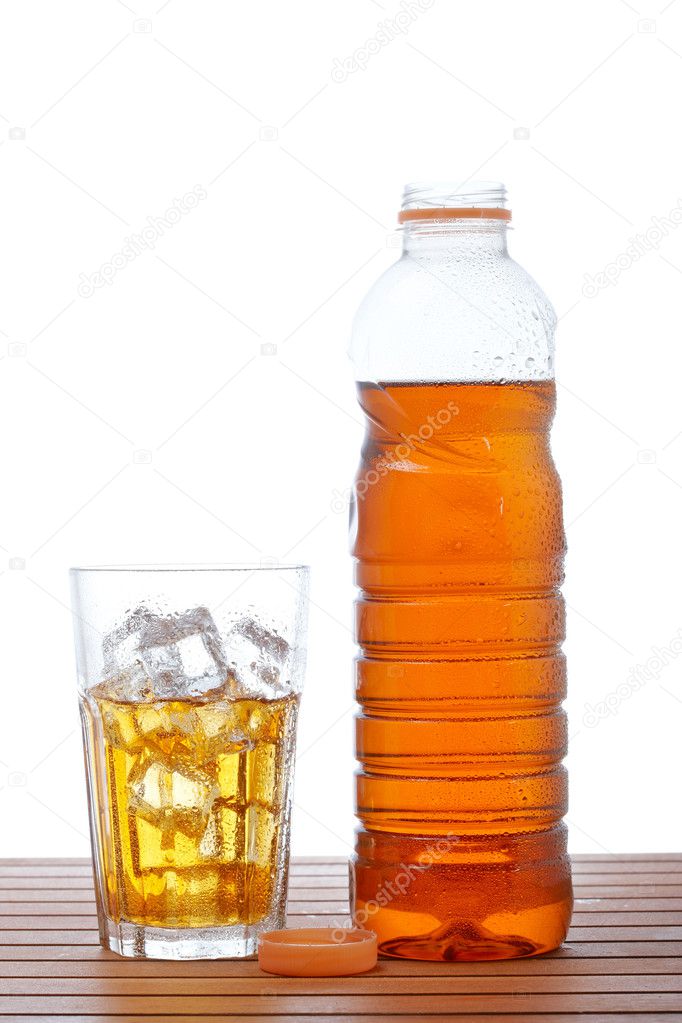 Glass and bottle of ice tea