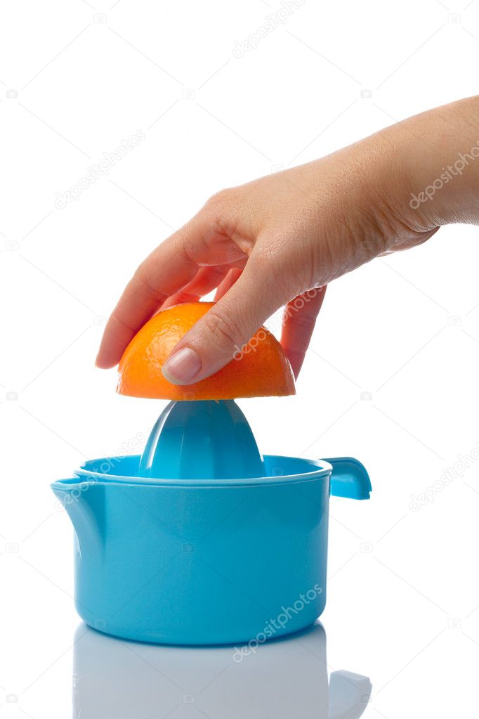 Woman squeezing orange