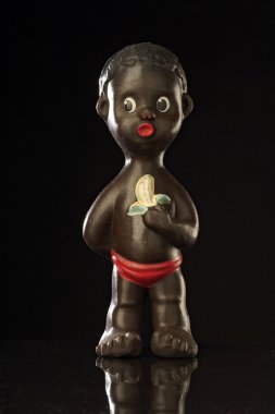 Toy of an african boy clipart