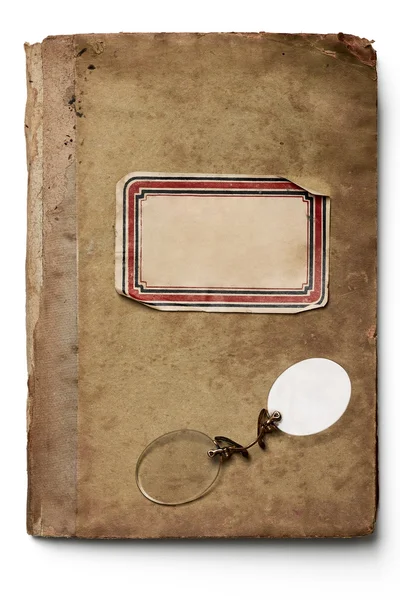 在孤立的旧笔记本上的无框眼镜 — 图库照片